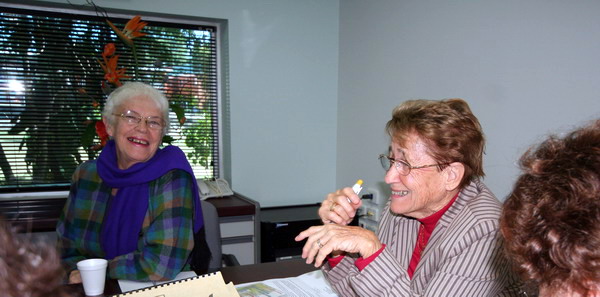 A group of people in a meeting