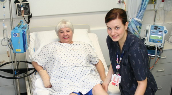 A nurse assisting a patient