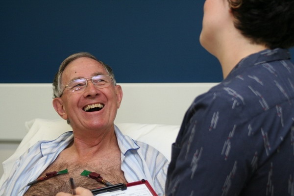 A nurse interacting with a patient