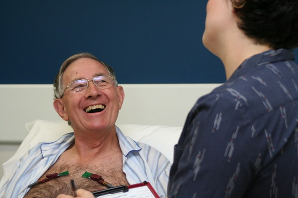 A nurse interacting with a patient